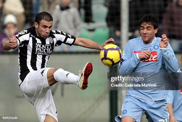 Abdel Kader Ghezzal of AC Siena competes for the ball against Luca Cigarini of SSC Napoli during the Serie A match between AC Siena and SSC Napoli at...