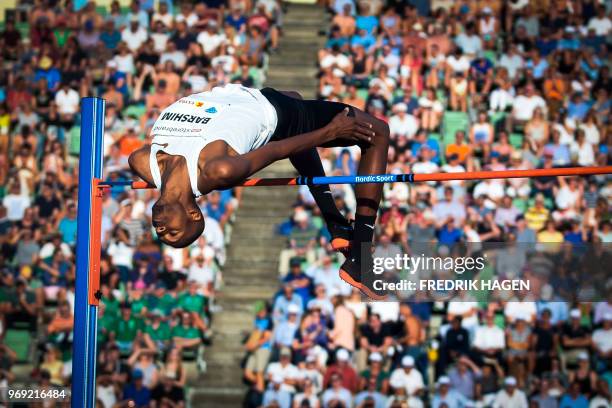 Qatar's Mutaz Essa Barshim competes during the Men's High Jump at the IAAF Diamond League 2018 Bislett Games on June 7, 2018 at Bislett Stadium in...