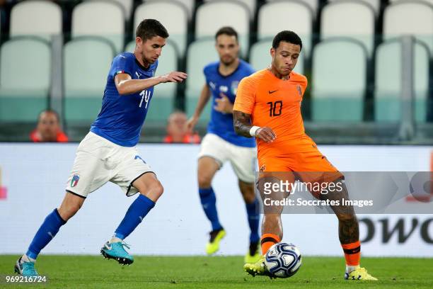 Jorge Luis Frello Jorginho of Italy, Memphis Depay of Holland during the International Friendly match between Italy v Holland at the Allianz Stadium...