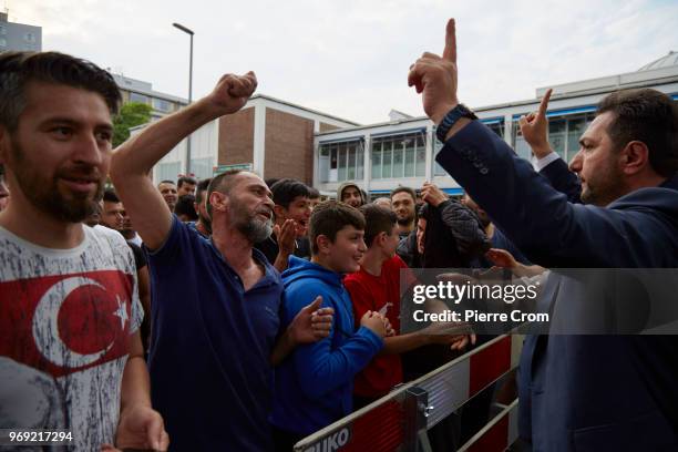 Group of muslim men cheer as anti-islam group Pegida cancelled a planned barbecue on June 7, 2018 in Rotterdam, Netherlands.The anti-islam group...