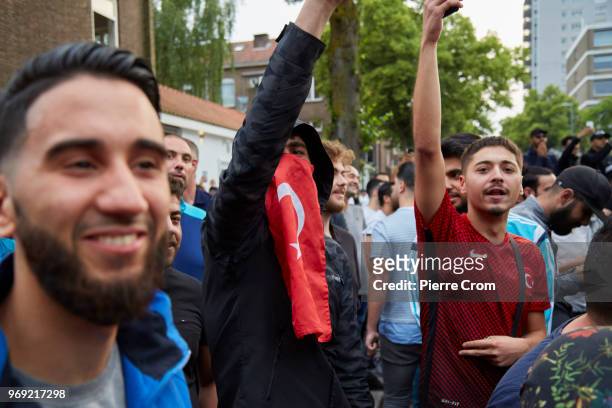 Group of muslim men cheer as anti-islam group Pegida cancelled a planned barbecue on June 7, 2018 in Rotterdam, Netherlands.The anti-islam group...