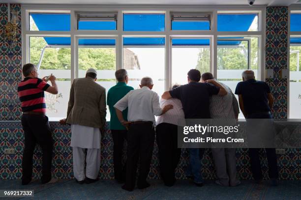 Group of muslim men wait inside the Laleli mosque for anti-islam group Pegida on June 7, 2018 in Rotterdam, Netherlands.The anti-islam group Pegida...