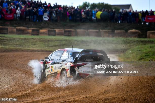 Finnish driver Jari-Matti Latvala and compatriot co-driver Miikka Anttila drive their Toyota Yaris WRC at "Arena motocross" of Ittiri village, on...