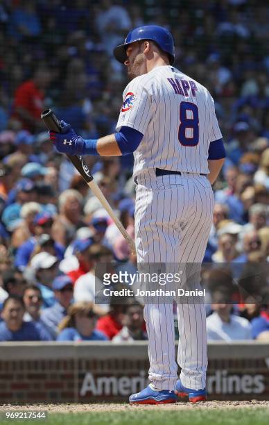 Ian Happ of the Chicago Cubs looks back at home plate umpire Nick Mahrley after striking out in the 2nd inning against the Philadelphia Phillies at...
