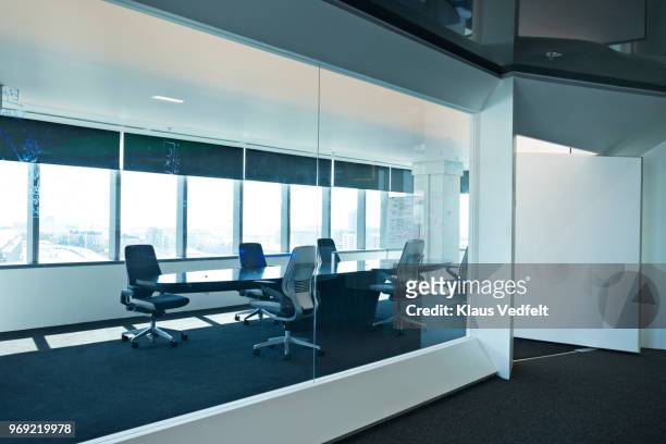 interior shot of modern designed boardroom in office building - fensterfront innen stock-fotos und bilder