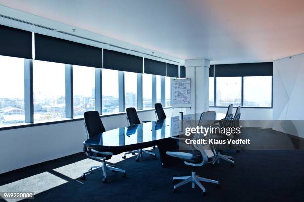 interior shot of modern designed boardroom in office building - fensterfront innen stock-fotos und bilder