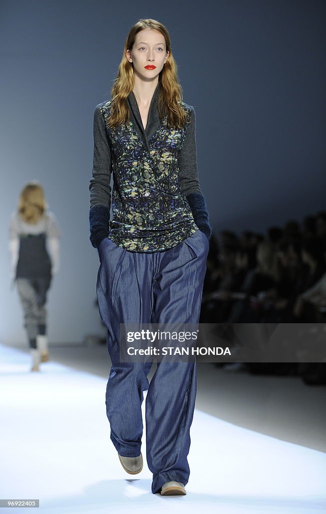 A model presents an outfit at the Richar