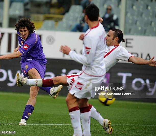 Stevan Jovetic of ACF Fiorentina battles for the ball against Davide Marchini of AS Livorno during the Serie A match between ACF Fiorentina and AS...