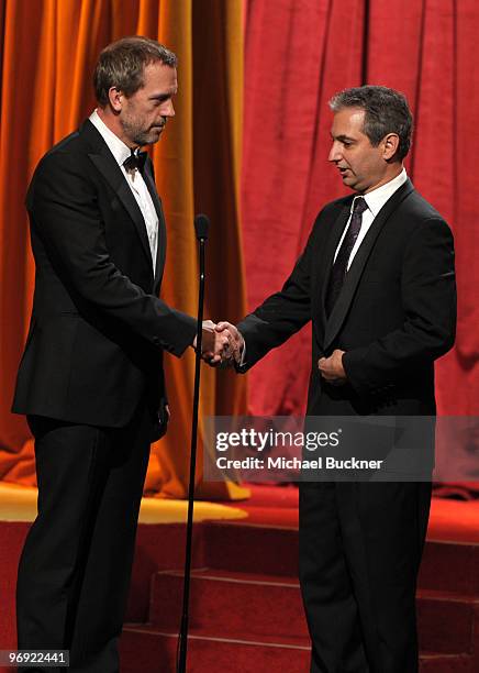 Actor Hugh Laurie and producer David Shore onstage at the 2010 Writers Guild Awards held at the Hyatt Regency Century Plaza on February 20, 2010 in...