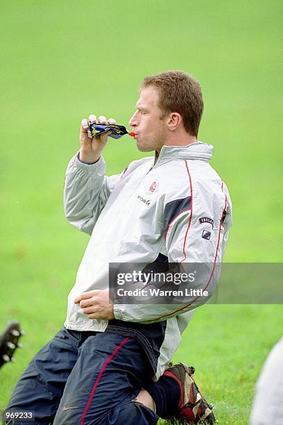 Mike Catt of England drinks Lucozade Sport during a Training Session at Sandhurst Acadamy in Camberley, Surrey, England. \ Mandatory Credit: Warren...