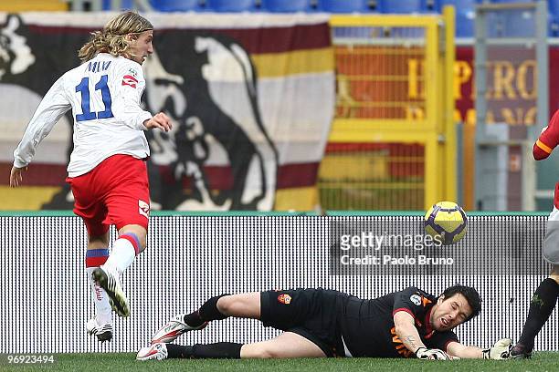 Maxi Lopez of Catania Calcio and Alexander Doni the goalkeeper of AS Roma compete for the ball during the Serie A match between AS Roma and Catania...