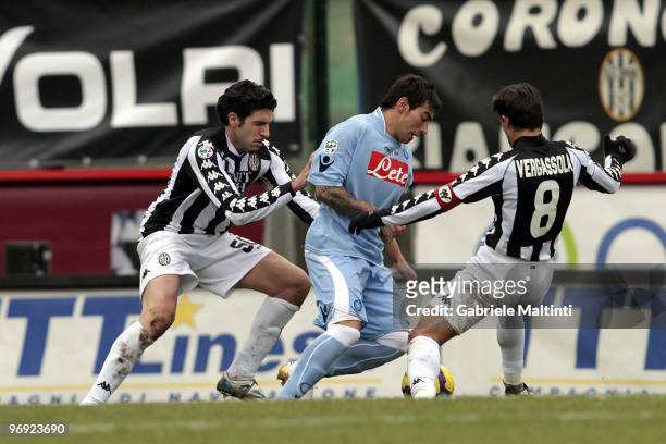 Francesco Pratali and Simone Vergassola of AC Siena in action against Ezquiel Ivan Lavezzi of SSC Napoli during the Serie A match between AC Siena...