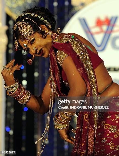 An Indian transgender gestures during the finals of the 'Indian Super Queen' beauty pagaent for the transgender community in Mumbai on February 21,...