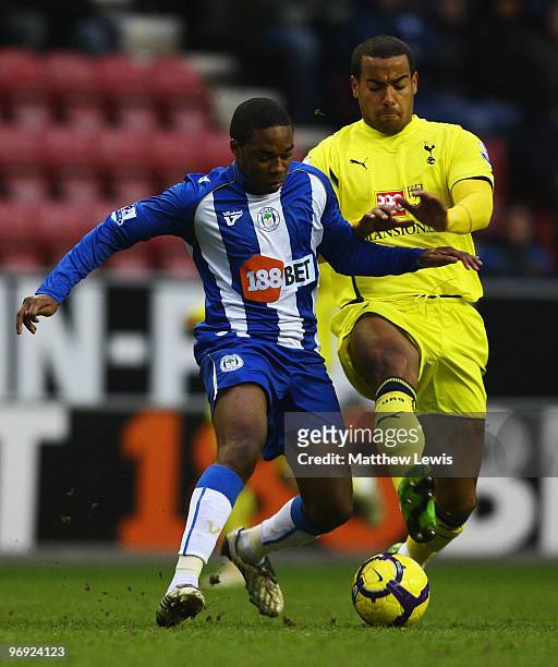 Charles N'Zogbia of Wigan and Tom Huddlestone of Tottenham challenge for the ball during the Barclays Premier League match between Wigan Athletic and...