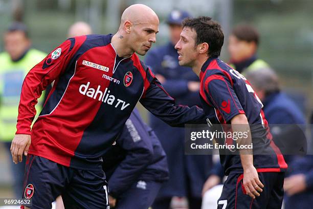 Andrea Parola; Andrea Cossu of Cagliari during the Serie A match between Cagliari Calcio and Parma FC at Stadio Sant'Elia on February 21, 2010 in...