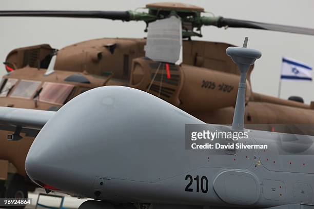 The Eitan, the Israeli Air Force's latest generation of Unmanned Aerial Vehicle , is displayed alongside a CH-53 helicopter during a ceremony...