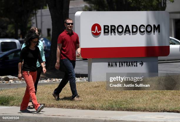 Signage is displayed outside the Broadcom offices on June 7, 2018 in San Jose, California. Broadcom is expected to report second-quarter earnings...