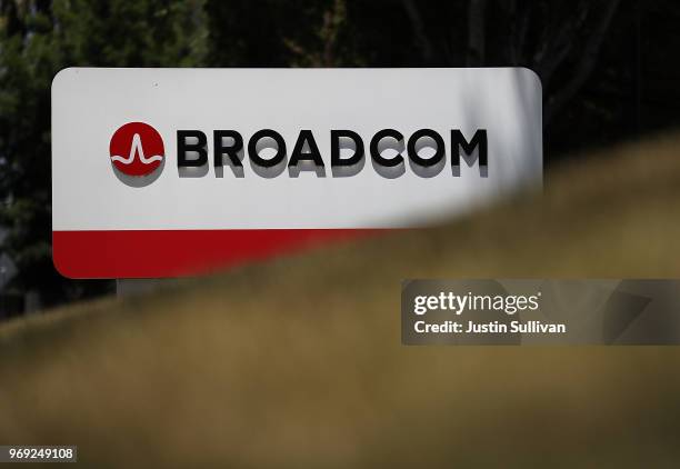 Signage is displayed outside the Broadcom offices on June 7, 2018 in San Jose, California. Broadcom is expected to report second-quarter earnings...