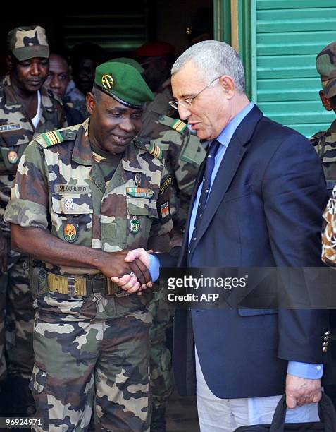 Representative Said Djinnit speaks with Salou Djibo , leader of the coup that overthrew Niger's president Mamadou Tandja, on February 21, 2010 at a...