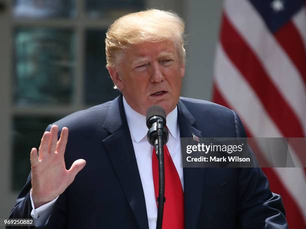 President Donald Trump speaks during a news conference with Japanese Prime Minister Shinzo Abe in the Rose Garden at the White House on June 7, 2018...