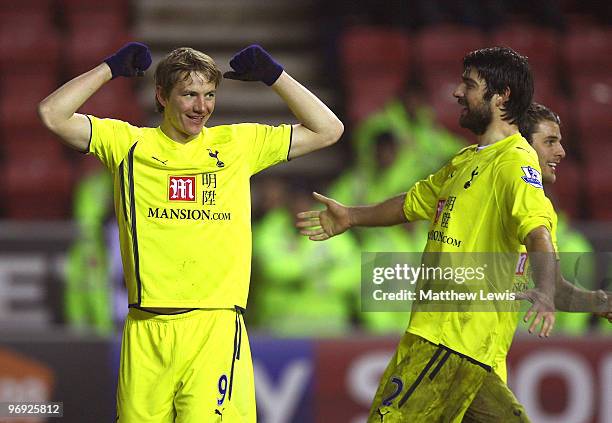 Roman Pavlyuchenko of Tottenham celebrates his goal during the Barclays Premier League match between Wigan Athletic and Tottenham Hotspur at the DW...