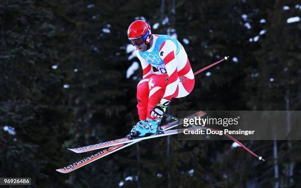 Didier Defago of Switzerland competes during the Alpine Skiing Men's Super Combined Downhill on day 10 of the Vancouver 2010 Winter Olympics at...