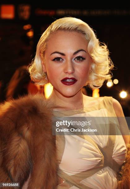 Actress Jaime Winstone attends the Orange British Academy Film Awards 2010 at the Royal Opera House on February 21, 2010 in London, England.