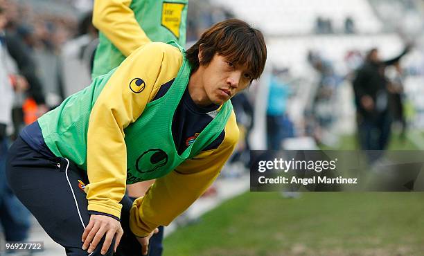 Shunsuke Nakamura of Espanyol warms up on the sideline during the La Liga match between Malaga and Espanyol at La Rosaleda Stadium on February 21,...