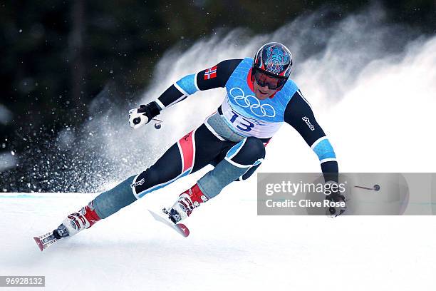 Aksel Lund Svindal of Norway competes during the Alpine Skiing Men's Super Combined Downhill on day 10 of the Vancouver 2010 Winter Olympics at...