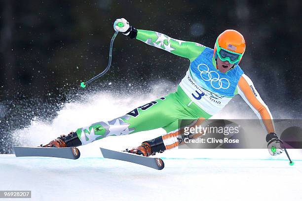 Ted Ligety of the United States competes during the Alpine Skiing Men's Super Combined Downhill on day 10 of the Vancouver 2010 Winter Olympics at...