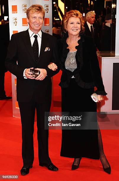 Cilla Black and Nigel Lythgoe attends the Orange British Academy Film Awards 2010 at the Royal Opera House on February 21, 2010 in London, England.