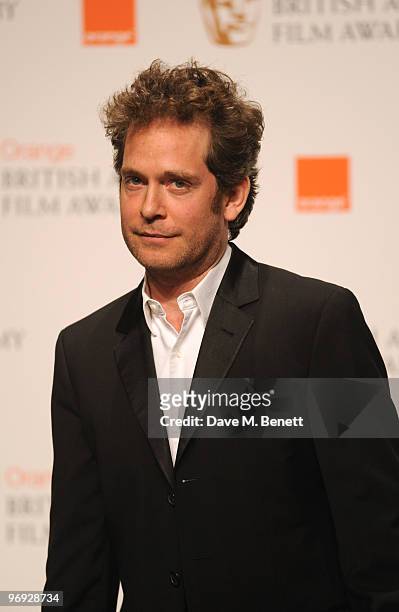 Tom Hollander poses in the awards room during the The Orange British Academy Film Awards 2010, at The Royal Opera House on February 21, 2010 in...