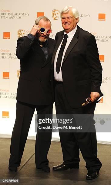 Joe Dunton poses with the Outstanding Contribution to Cinema Award presented by Terry Gilliam during the The Orange British Academy Film Awards 2010,...