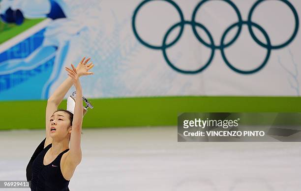 Yu Na Kim of Korea performs in her figure skating training session during the 2010 Winter Olympics at the Pacific Coliseum in Vancouver on February...