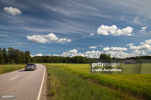 driving in finland's countryside - finland summer stock pictures, royalty-free photos & images