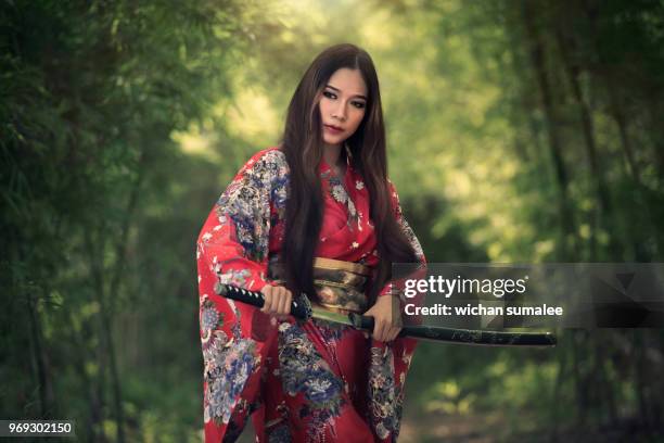 japanese geisha - children role playing crime stock-fotos und bilder