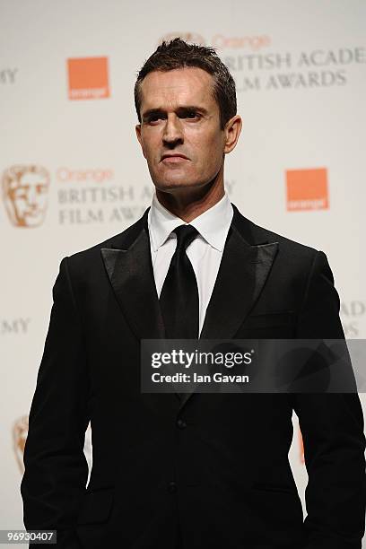 Actor Rupert Everett poses in the awards room during the Orange British Academy Film Awards 2010 at the Royal Opera House on February 21, 2010 in...