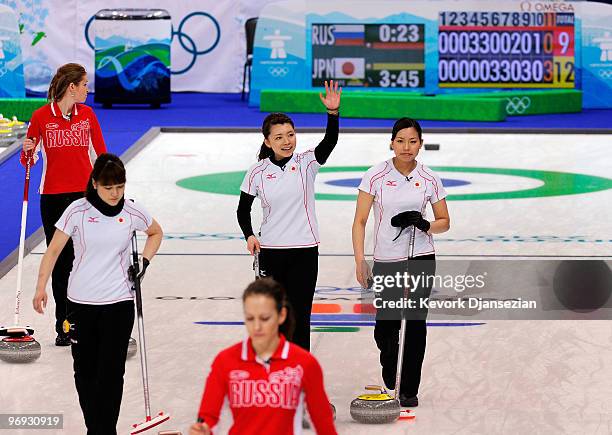 Mari Motohashi of Japan celebrates after defeating Russia, 12-9, during the women's curling round robin game between Japan and Russia on day 10 of...