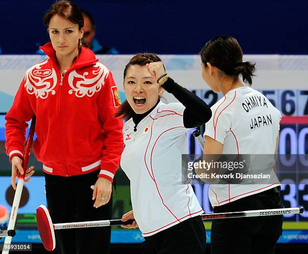 Mari Motohashi of Japan celebrates after defeating Russia, 12-9, during the women's curling round robin game between Japan and Russia on day 10 of...