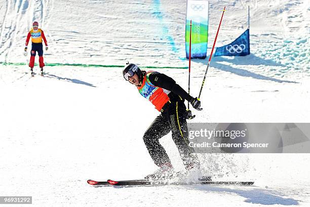 Michael Schmid of Switzerland celebrates winning the gold medal in men's ski cross on day ten of the Vancouver 2010 Winter Olympics at Cypress...