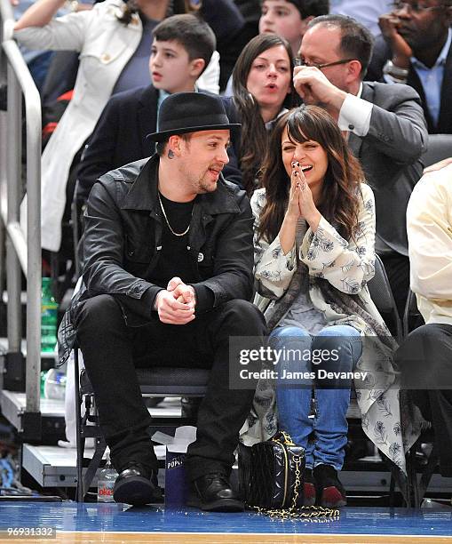 Joel Madden and Nicole Richie attend the Chicago Bulls vs New York Knicks game at Madison Square Garden on February 17, 2010 in New York City.