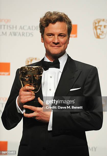 Colin Firth poses with the Best Actor Award for A Single Man during the The Orange British Academy Film Awards 2010, at The Royal Opera House on...