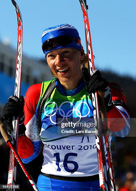 Olga Zaitseva of Russia celebrates winning silver after the women's biathlon 12.5 km mass start on day 10 of the 2010 Vancouver Winter Olympics at...