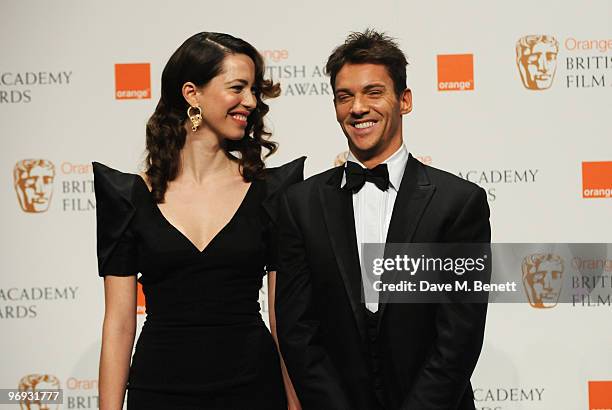 Rebecca Hall and Jonathan Rhys Meyers pose in the awards room during the The Orange British Academy Film Awards 2010, at The Royal Opera House on...