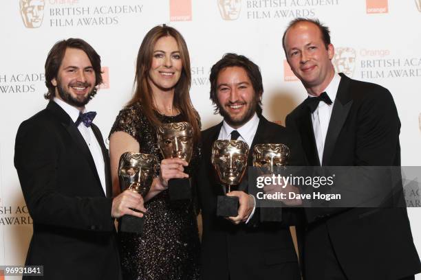 Mark Boal, Nicolas Chartier, Kathryn Bigelow and Greg Shapiro pose with the best film award in front of the winners boards at the Orange British...