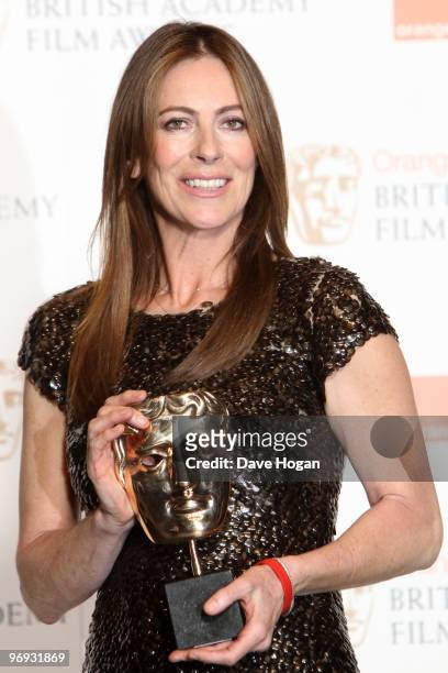 Kathryn Bigelow poses with her best director award in front of the winners boards at the Orange British Academy Film Awards held at The Royal Opera...
