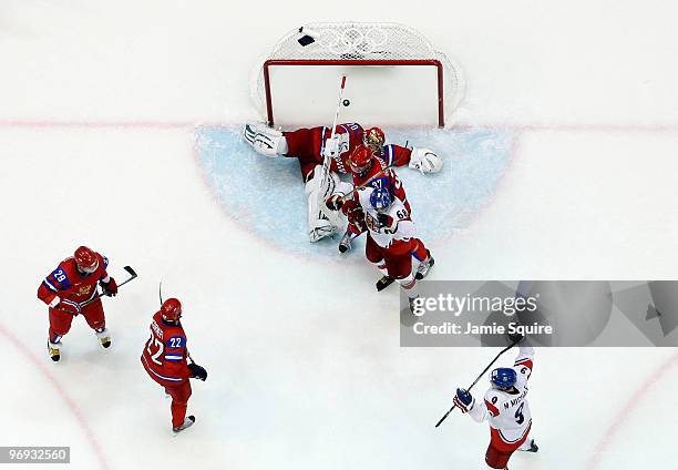 Jaromir Jagr and Milan Michalek of Czech Republic celebrate after Michalek scored a third period goal against goalie Evgeni Nabokov of Russia during...