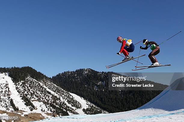 Audun Groenvold of Norway and Christopher Delbosco of Canada compete in the men's ski cross race big final on day ten of the Vancouver 2010 Winter...