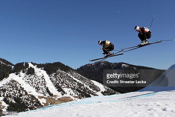 Richard Spalinger of Switzerland and Thomas Zangerl of Austrias compete in a men's ski cross race on day ten of the Vancouver 2010 Winter Olympics at...