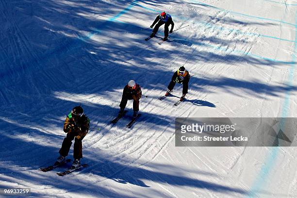 Sylvain Miaillier of France leads Xavier Kuhn of France, Markus Wittner of Austria and Juha Haukkala of Finland in a men's ski cross race on day ten...